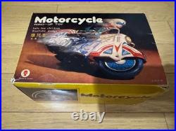 Jouet ancien moto remontoir MS 702 étain modèle MS702 pièce maîtresse de