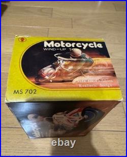 Jouet ancien moto remontoir MS 702 étain modèle MS702 pièce maîtresse de